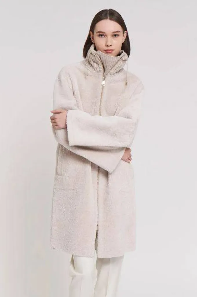 La collection Automne-Hiver Manzoni 24, le confort, l'élégance, des tons de crème et de chocolat qui ont séduit Sacha.