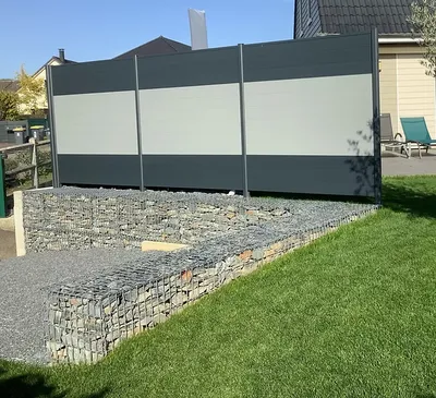 Muret de soubassement en gabions de pierre à Louviers (27400) : un aménagement extérieur esthétique et durable