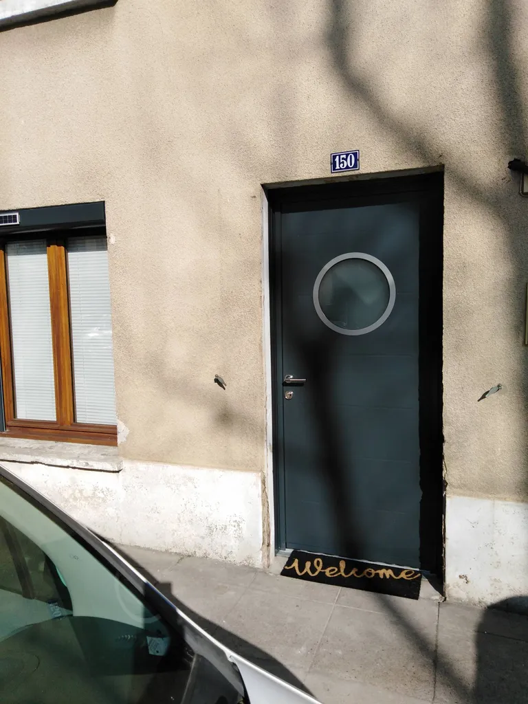 Remplacement d'une ancienne porte en bois par une porte d'entrée en ALUMINIUM à VILLEFRANCHE SUR SAONE