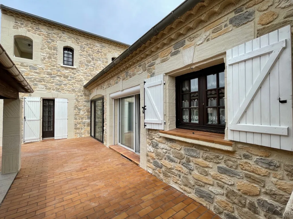 Rénovation des façades en pierre sur Bessan dans l’Hérault