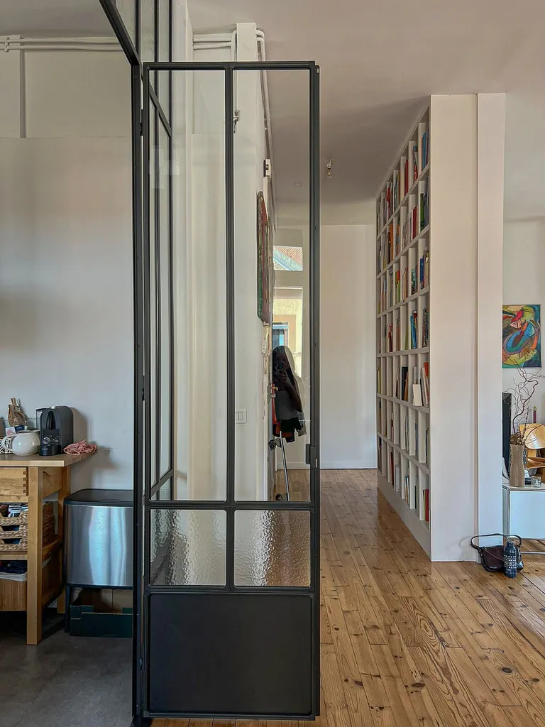 Création d'une verrière sur mesure pour un appartement au style éclectique au cœur de Touloue