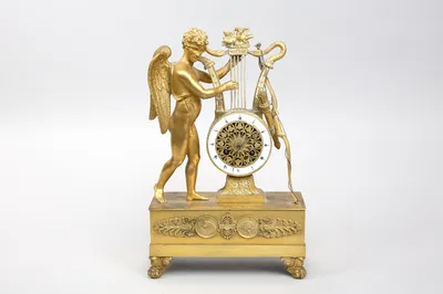 Pendule Epoque Restauration en bronze doré