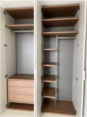 Conception sur mesure d'un intérieur de dressing en noyer de fabrication italienne avec pose à Bandol dans le 83