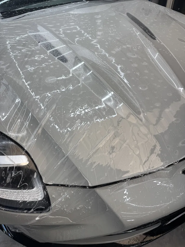 Film de protection XPEL : Aston Martin V8 Vantage protection face avant et bas de caisse Riviera Detailing Monaco 98