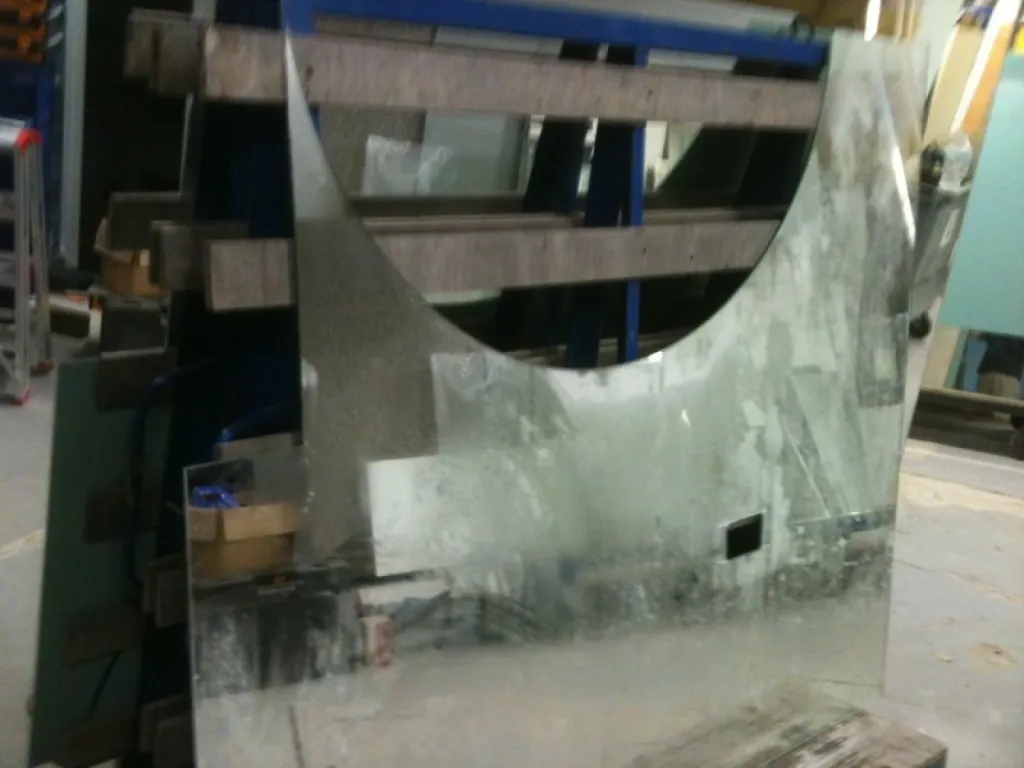 Façonnage de miroir en forme