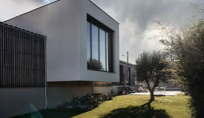 Construire une villa contemporaine RE2020 avec toiture terrasse et PAC gainable à Grisolles (82), près de canal