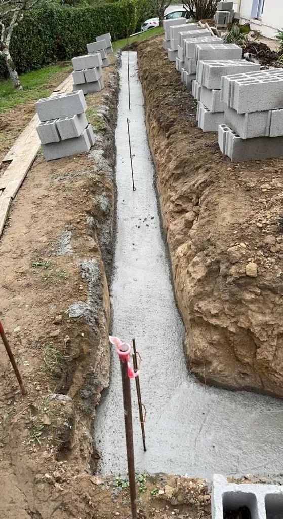 Travaux de terrassement avec création d'une fondation sur CADAUJAC.