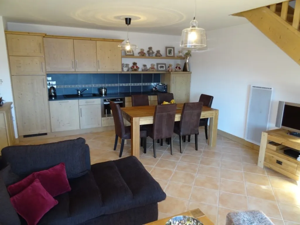 cuisine sur séjour entièrement équipée