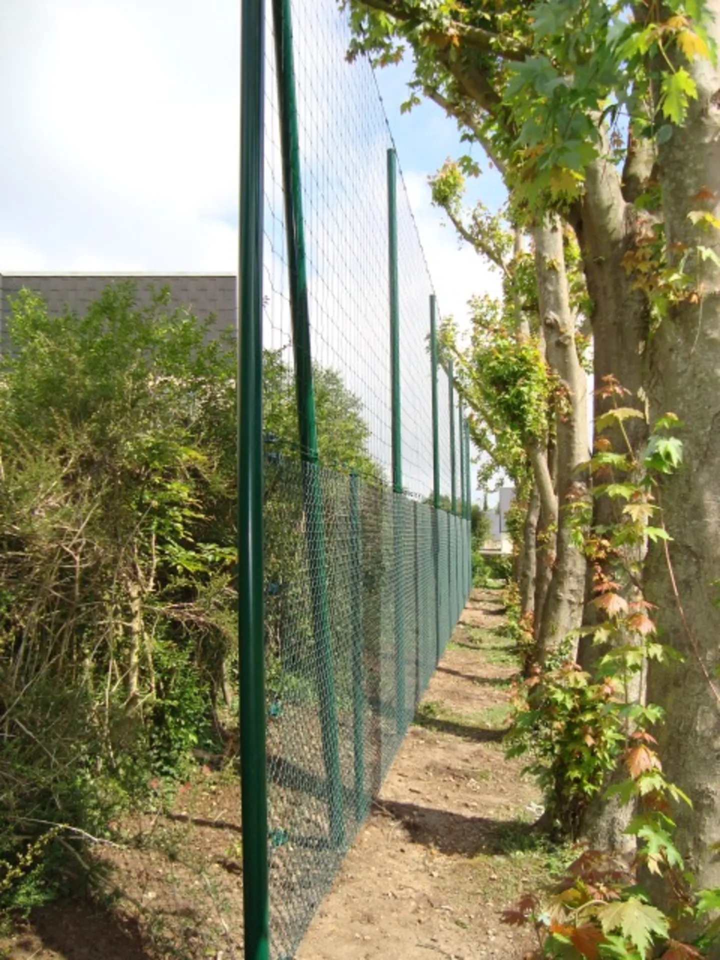 Installation de filet pare ballons