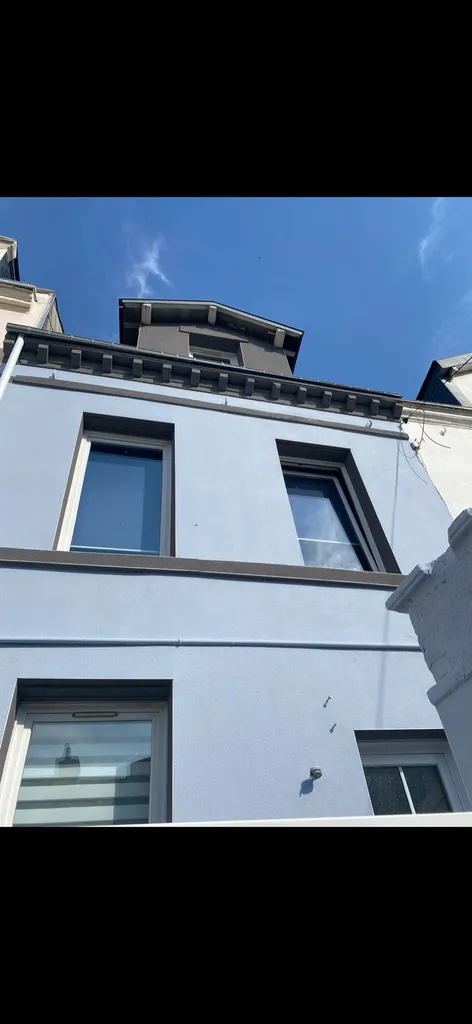 Rénovation d'une maison avec un enduit projeté à Montivilliers proche Le Havre