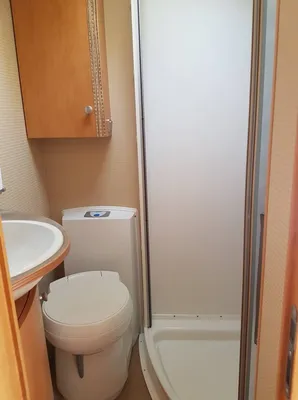 VENDU CAMPING CAR INTEGRAL PILOTE G710 INTEGRAL AVEC ATTELAGE