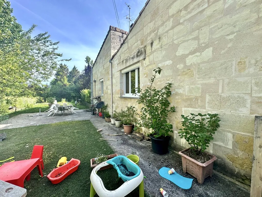 Acheter une maison en pierre plain-pied à Bouliac 4 pièces (T4) environ 100 m2 avec jardin, une cour et garage pour véhicule