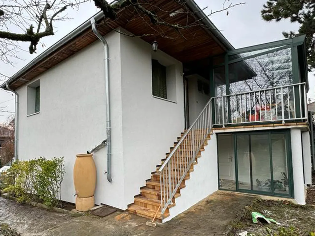 Nouveau confort intérieur grâce à l'isolation thermique par l'extérieur en graphite sur une maison à Ecully dans le département du Rhône (69)
