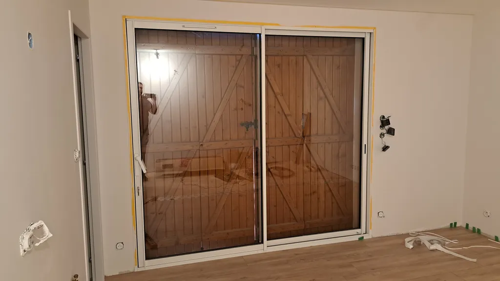 Baie coulissante après intervention du plaquiste