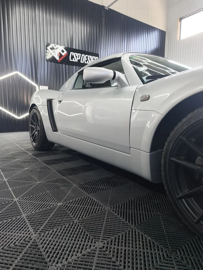 Pose film PPF FlexiShield Opel Speedster protection carrosserie transparente réalisée par CSP Design Clermont-Ferrand Puy-de-Dôme