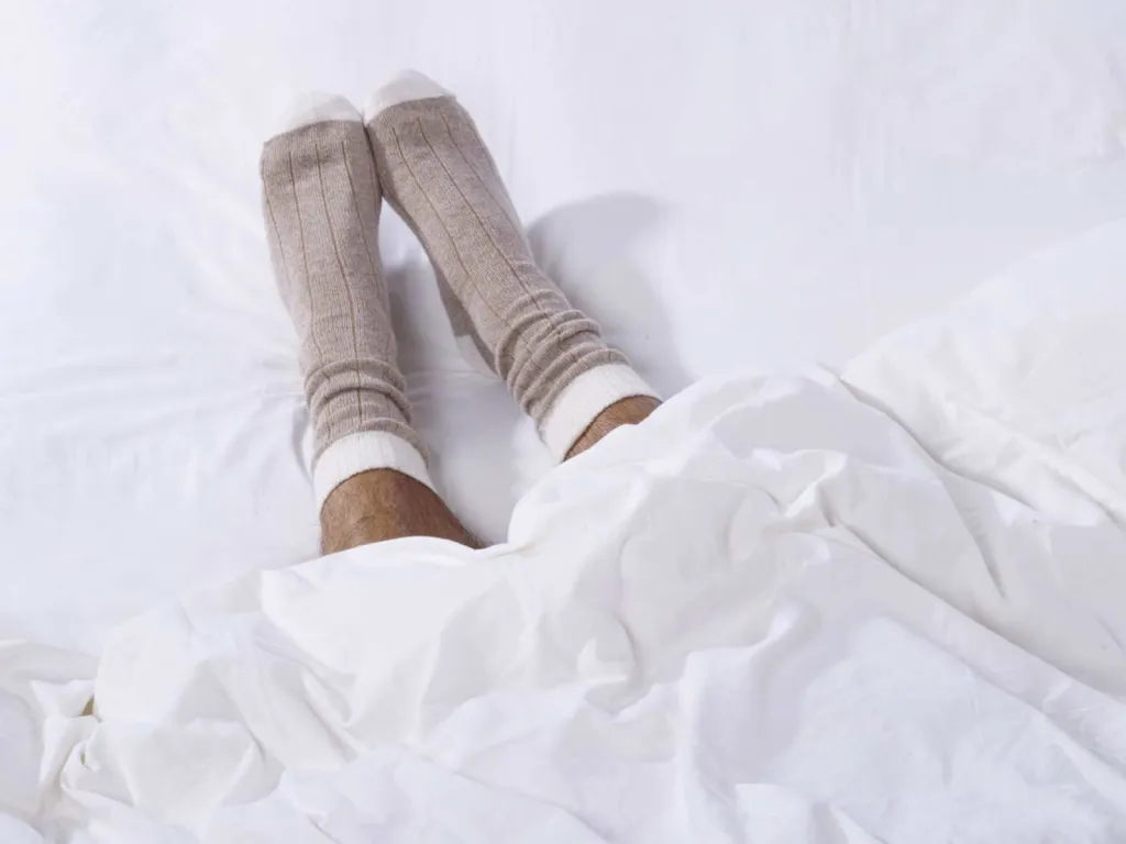 Photographe d'accessoires textile chaussettes homme