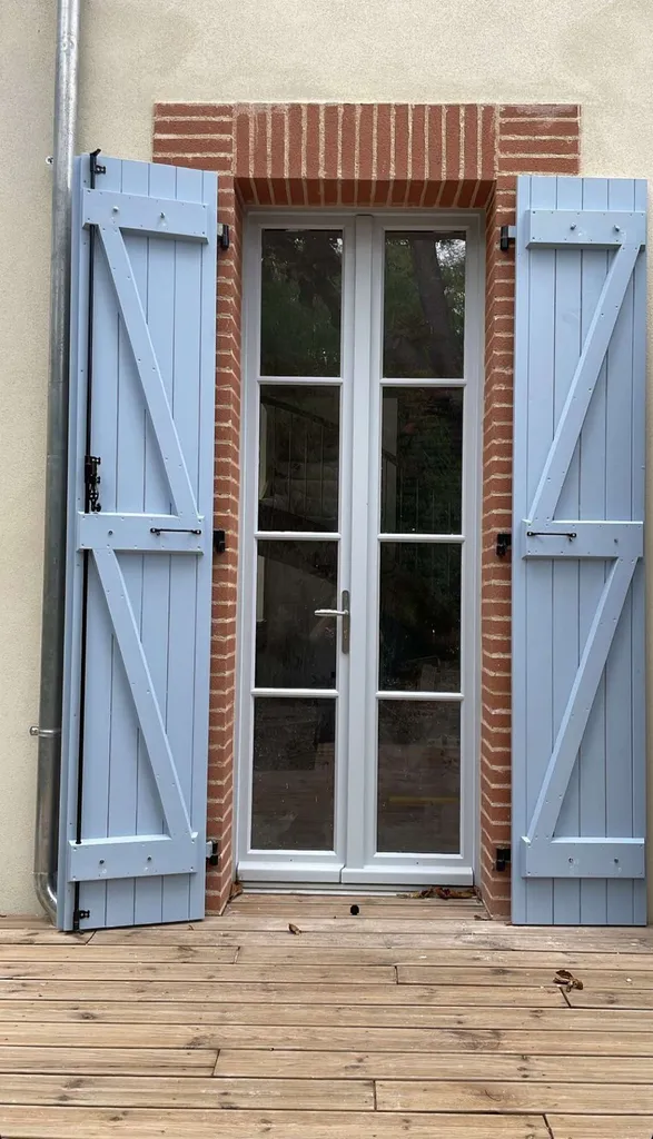 Volets battant barres et écharpes