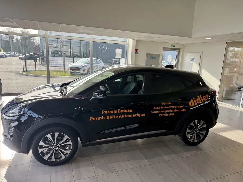 Flocage publicitaire et lettrage adhésif sur la flotte de véhicules de l'Auto-école Didier à Illkirch-Graffenstaden, Molsheim, Plobsheim et Lingolsheim