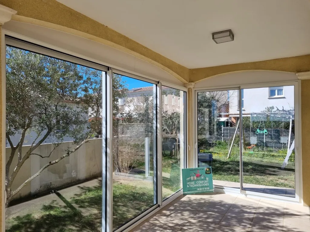 Installation d'une fermeture de terrasse sur la commune de Garons près de Nîmes