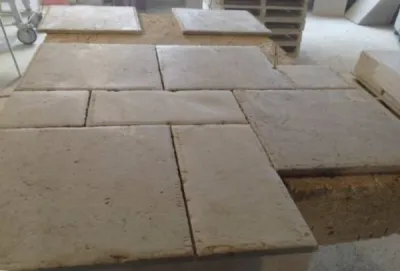 Dallage en pierre naturelle pour sol intérieur, terrasse et plage de piscine en extérieur. Quelle pierre choisir au 36 rue de Bourgogne à Paris ?