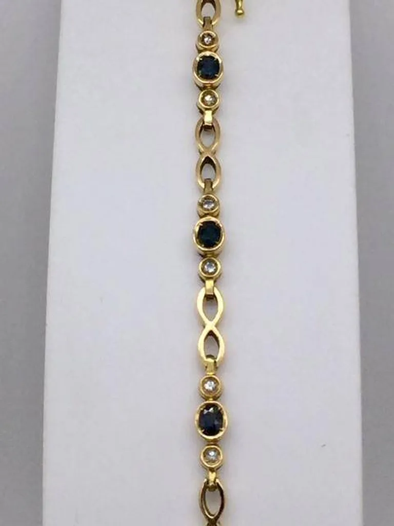 Bracelet or 750/1000ème saphirs et diamants occasion Or Ligne La Teste Bassin d'Arcachon