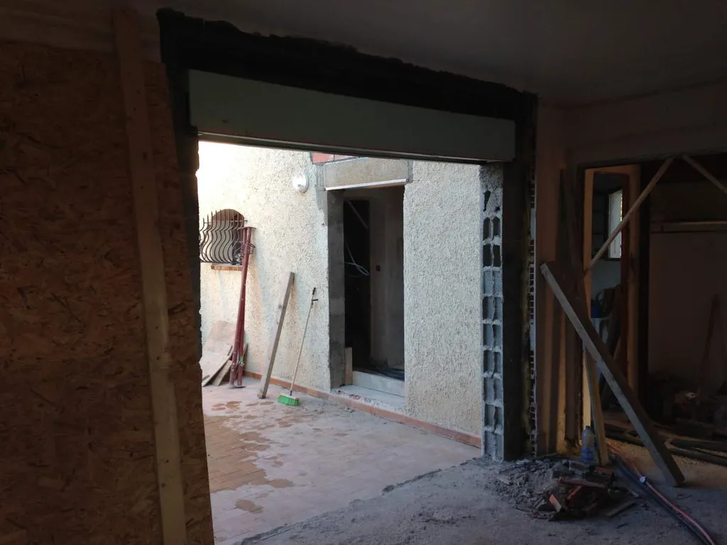 Agrandissement d'une ouverture extérieure dans une maison individuelle à salon de Provence 13300 - vue intérieure