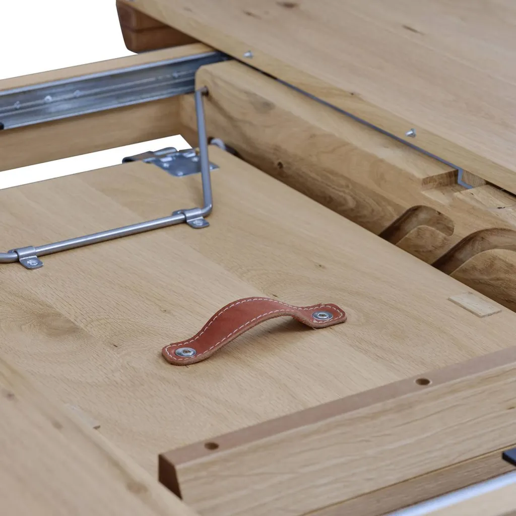 Vente d'une table ronde avec allonge  et pied en croix de fabrication Française