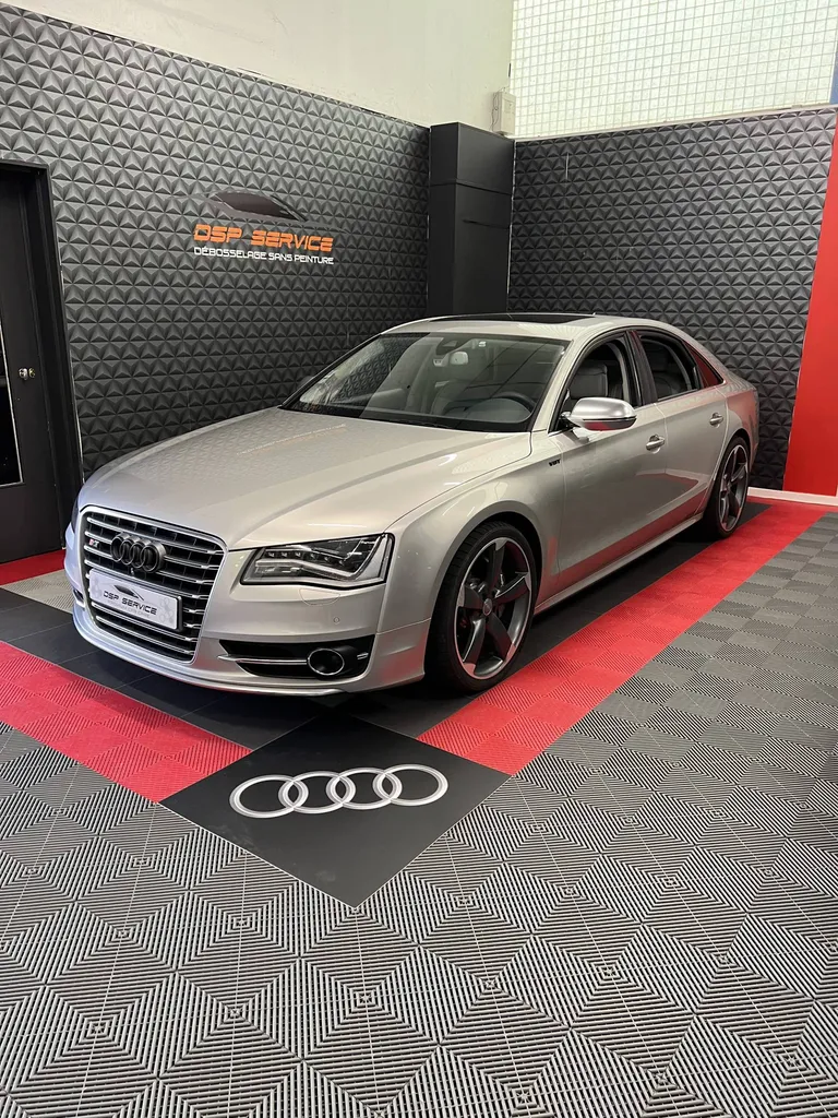 Reteinte et réparation des cuirs sur une Audi S8 à Le Mans (72)