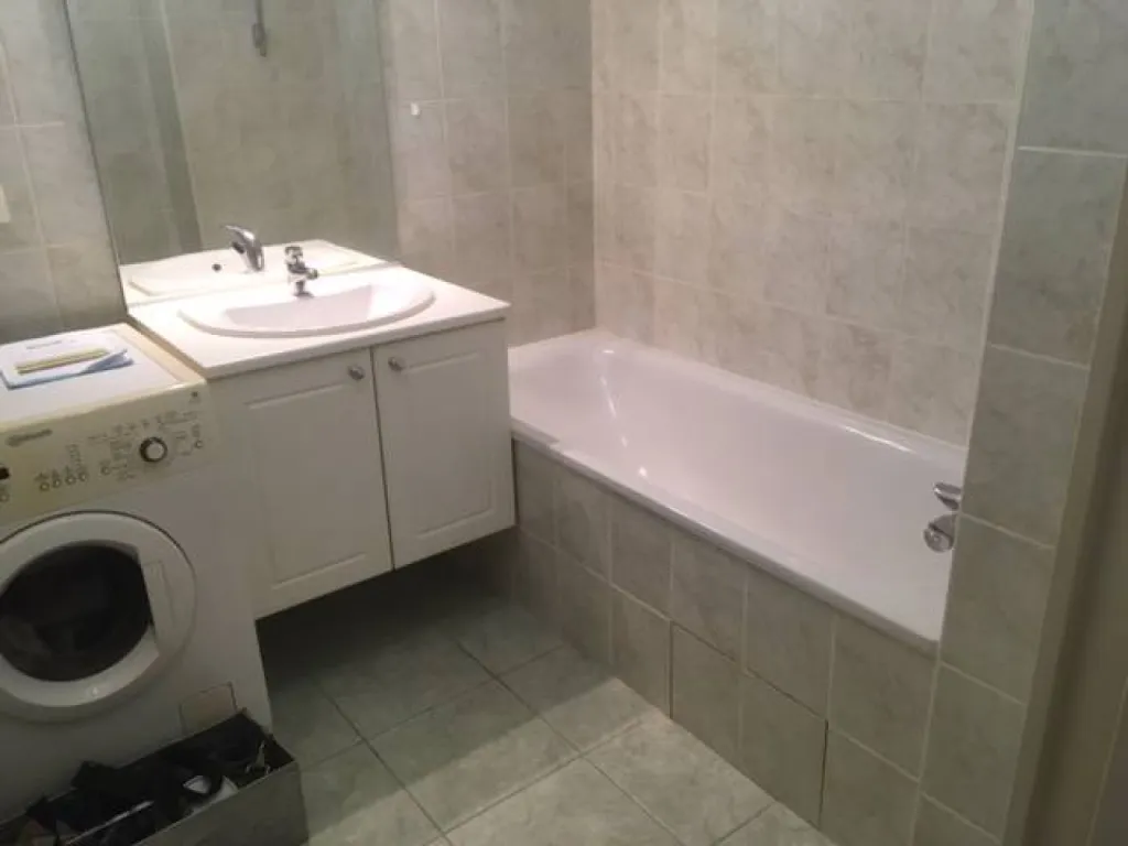 Douche personne agée baignoire avant