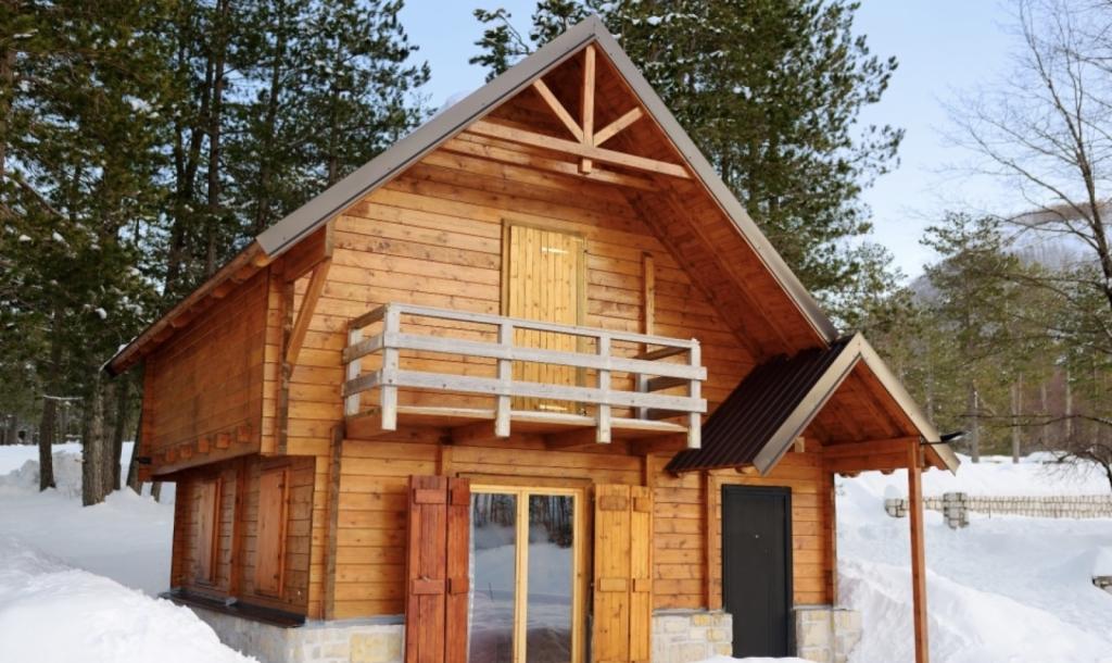  Maison en bois - chalet - abris de jardin