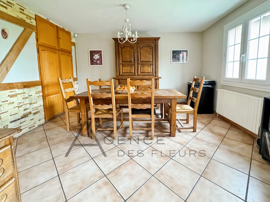 À vendre, maison de 94 m² sur un terrain de 1233 m²sur la commune de Saint-Aubin-les-Elbeuf