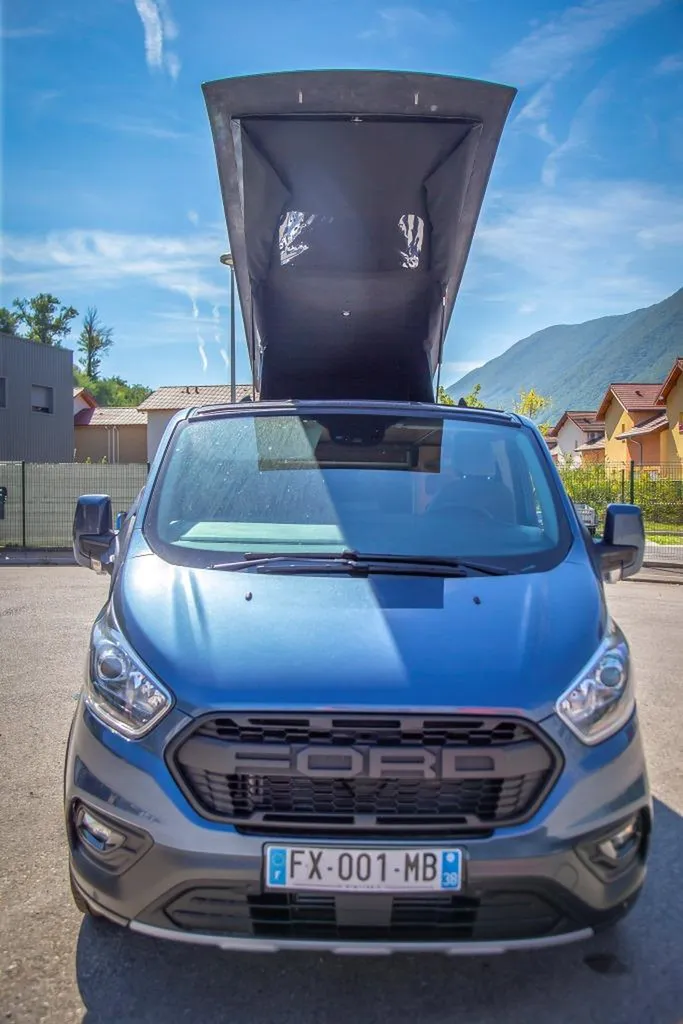 Pose de toit relevable Ford Transit Custom Long à Marseille : installation homologuée par carrossier dans les Bouches-du-Rhône