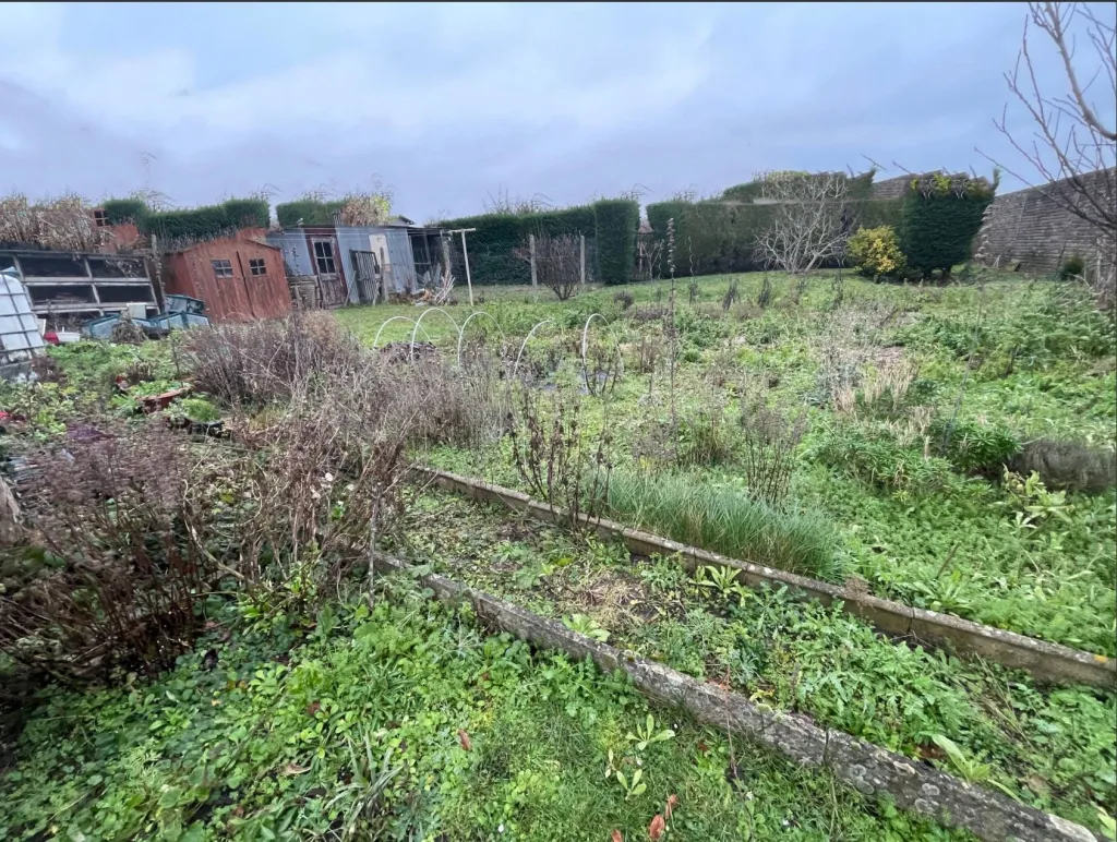 Maison de 100m² sur un jardin de 950m² avec appentis et garage