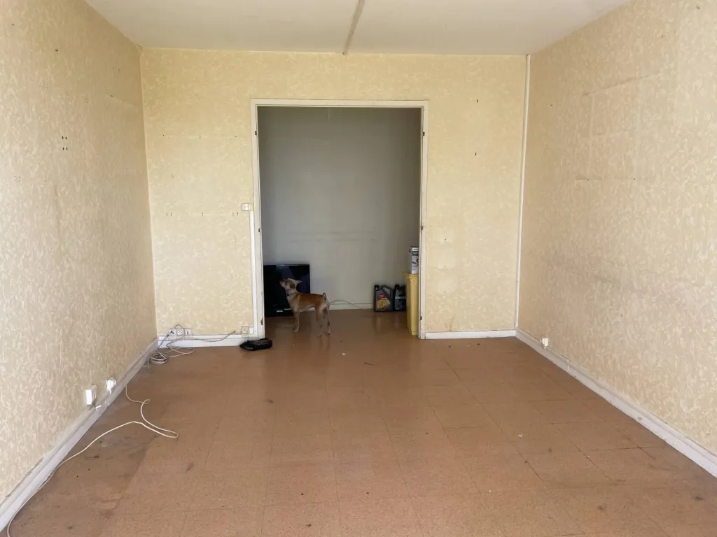 Salon salle à manger vidé par le déménagement Yvetotais OBEN