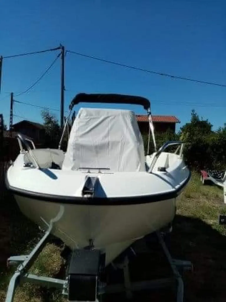 Mise en place housse de poste de pilotage pour bateau bassin d'arcachon