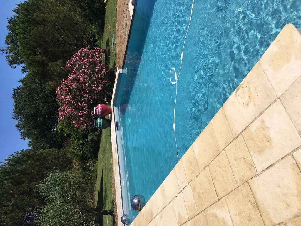 Pose de terrasse en pierre naturelle sur support drainant secteur rive droite