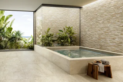 À Rouen, le travertin céramique THERMAE sublime les salles de bains modernes.