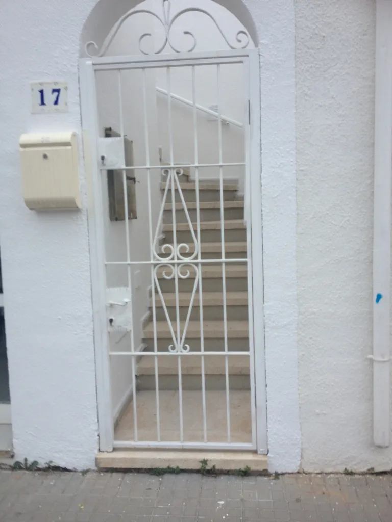 PORTILLONS METALLIQUE AVEC VOLUTES