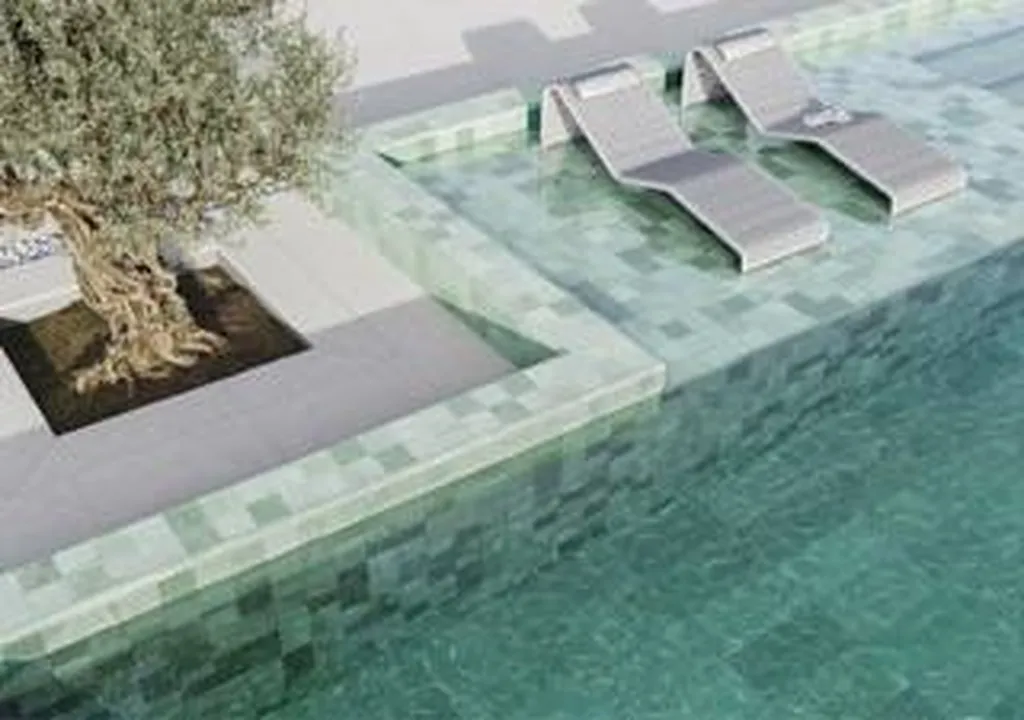 Carrelage extérieur effet pierre de Bali La Rochelle : sublimez votre piscine avec notre grès cérame antidérapant aux nuances exotiques uniques.