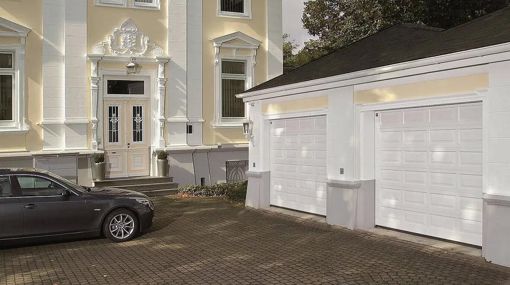 Porte de garage en rénovation de marque Hormann  à Villefranche sur Saone