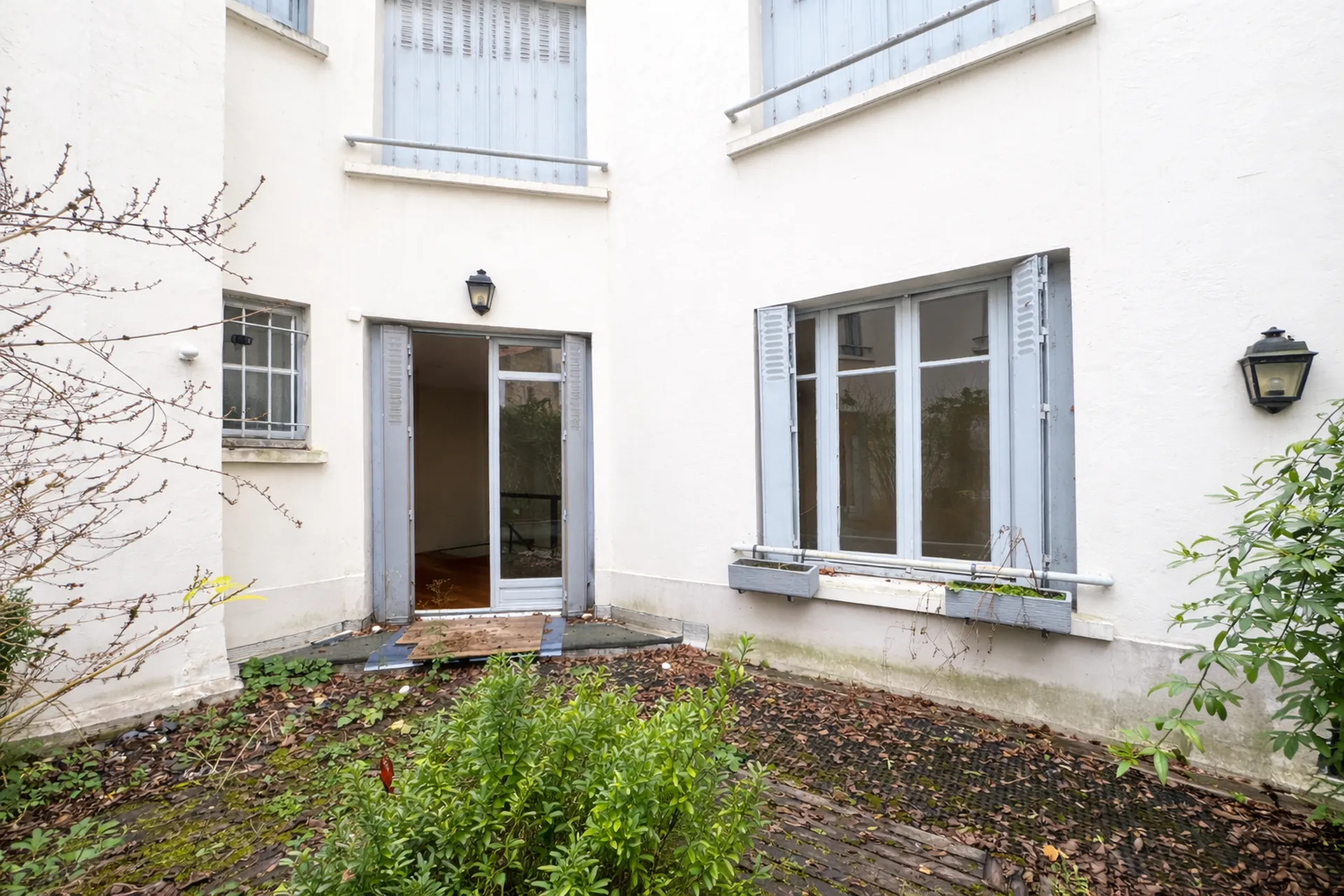 terrasse dans un appartement esprit loft atelier Helix immobilier 