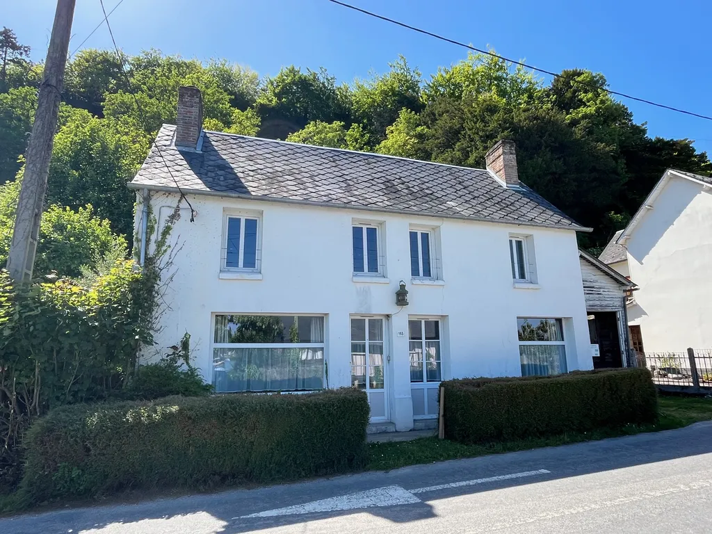 A vendre : maison de caractère d'environ 118m² habitable située en bord de Seine sur la commune d'Heurteauville