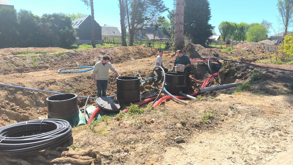 Raccordement de la cuve de récupération des eaux pluviales aux différents réseaux d'irrigation