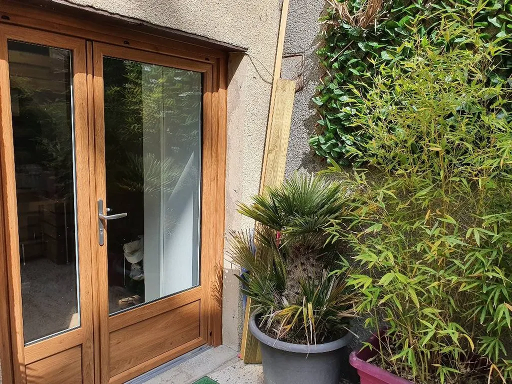 Porte fenêtre en bois exotique de marque  leul à SAINTE FOI LES LYON