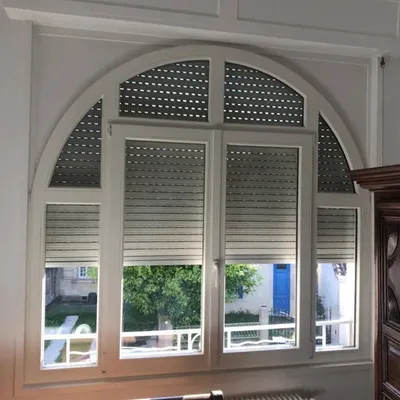 Pose en rénovation de fenêtres bois cintrées sur la commune de Bordeaux en Gironde 