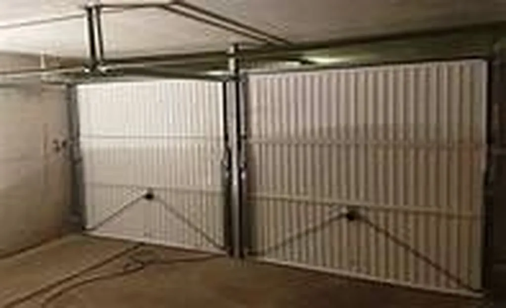 2 Portes pour un garage en sous sol à lyon 9