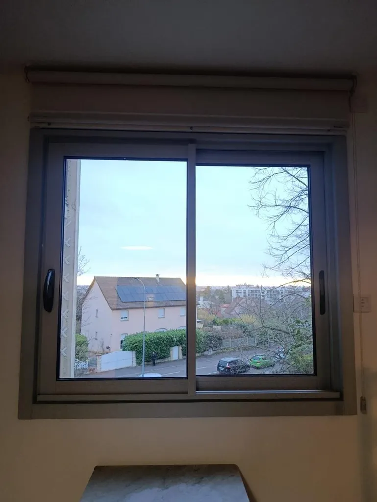Installation de menuiseries en aluminium coulissantes à rupture de pont thermique pour une rénovation performante à Talant