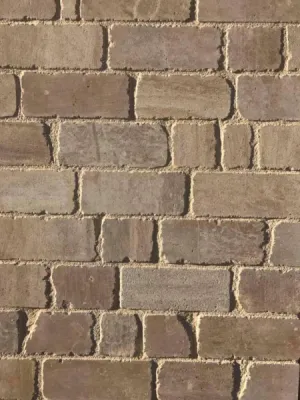 Pavés en pierre naturelle de France au 36 rue de Bourgogne à Paris, dallage intérieur et terrasse