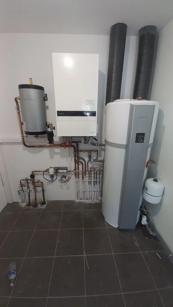 Installation d’une pompe à chaleur air/eau Panasonic avec plancher chauffant à Villemoirieu près de Bourgoin-Jallieu en Isère (38)