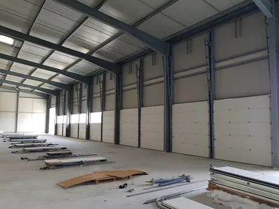 Systèmes d’entraînement pour portes sectionnelles : manuels, motorisés et solutions de sécurité